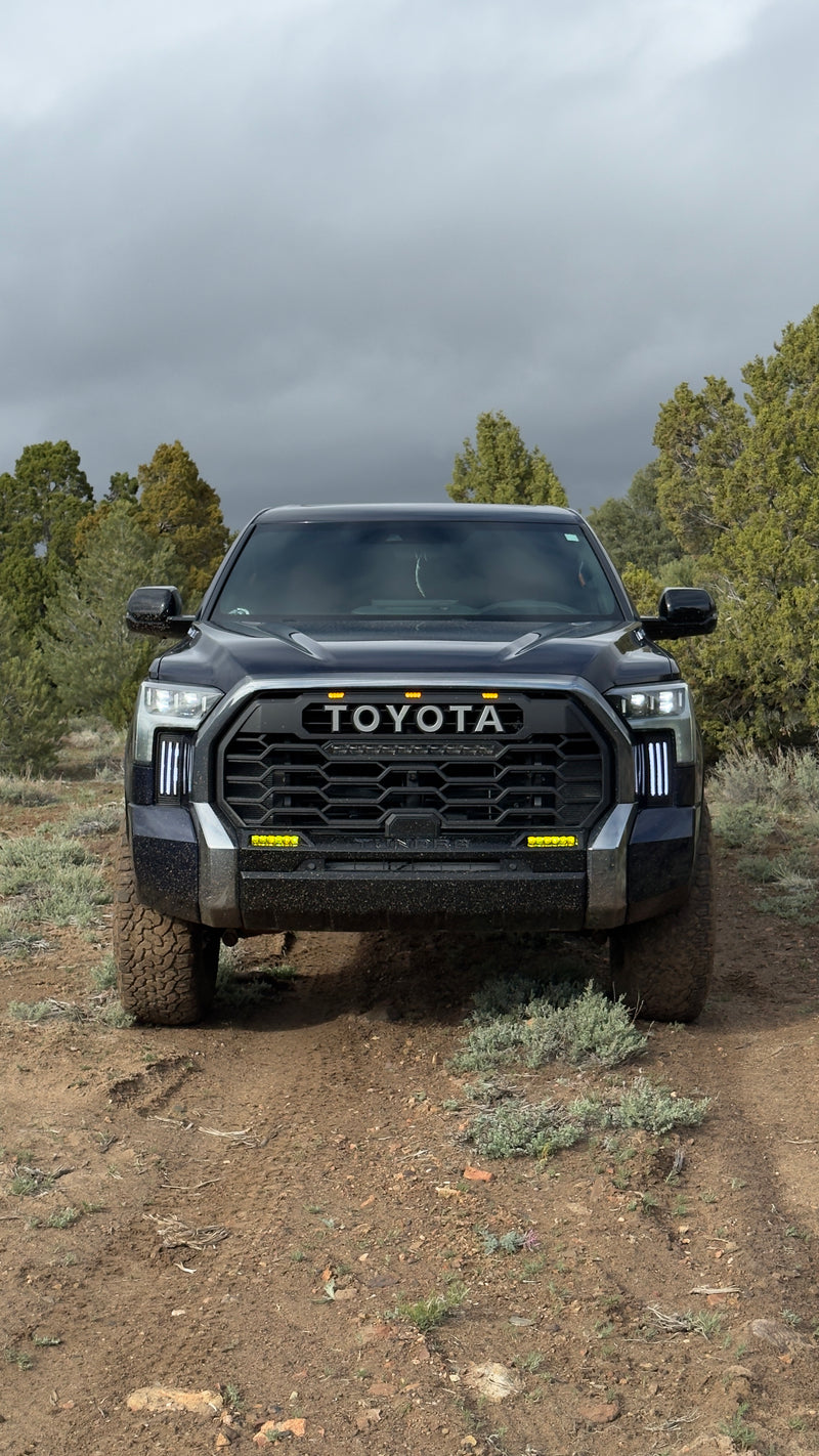 Yellow LED fog lights installed on a Toyota Tundra