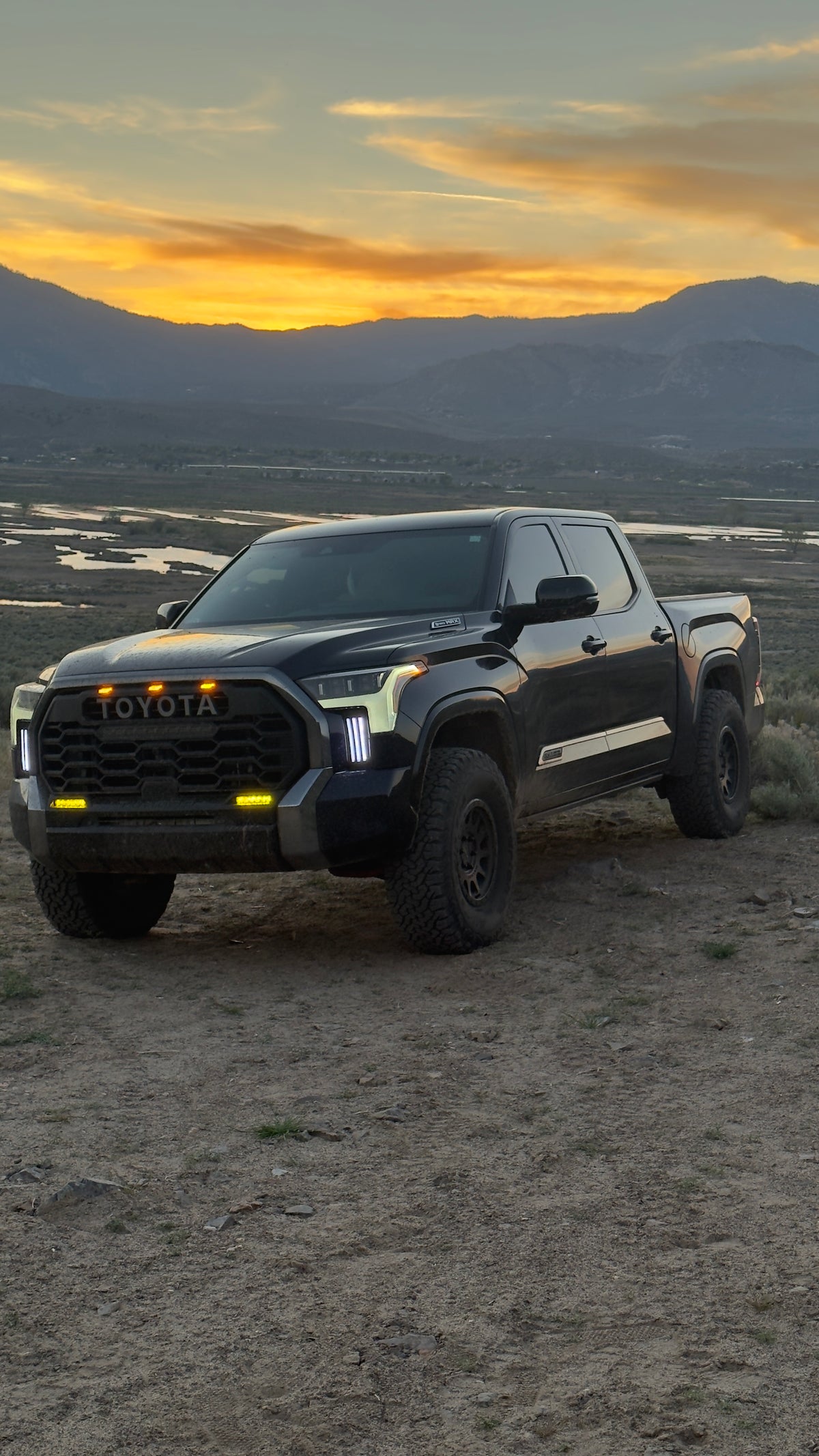 Toyota Tundra with yellow LED fog lights installed, photographed at sunset