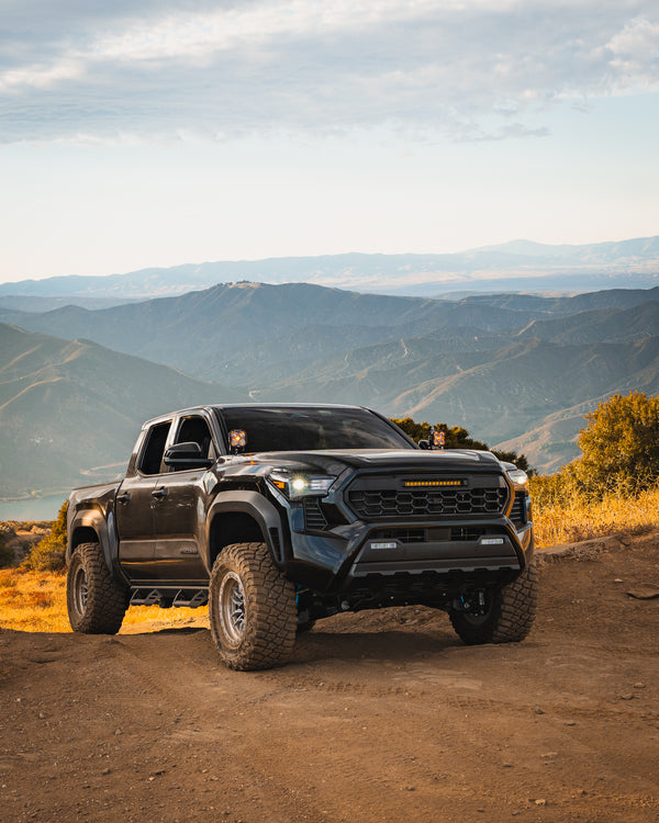 2024 Tacoma with Apex Pro grille in the mountains