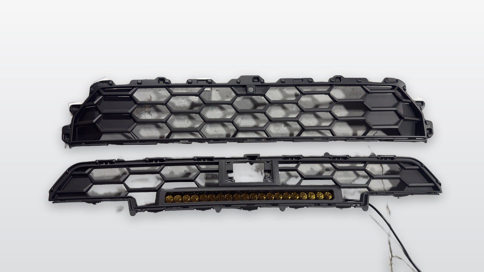 Apex Pro grille set for 2025+ Toyota 4Runner, front camera and sensor openings visible