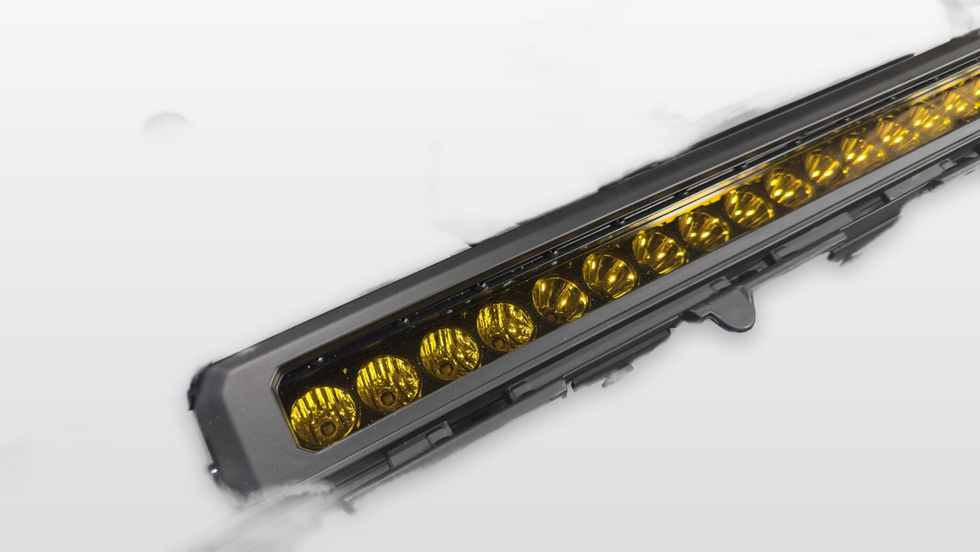 Close-up of integrated amber LED light bar on Apex Pro grille