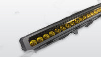 Close-up of integrated amber LED light bar on Apex Pro grille